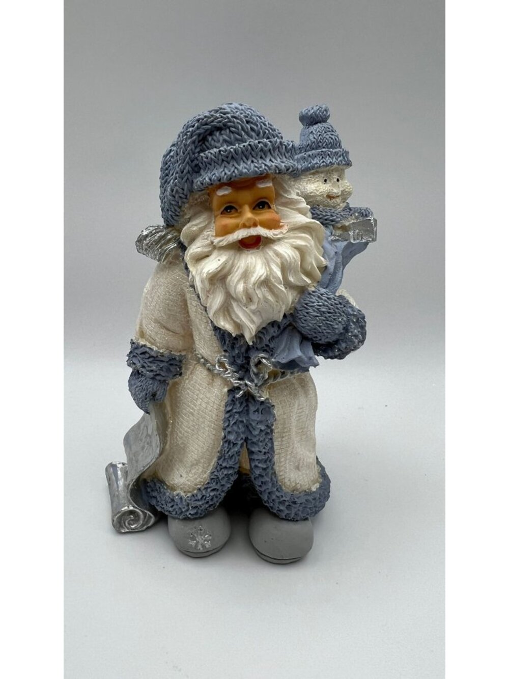Santa Figurine With Snowman In Winter Blue Tones